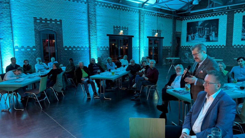 Staatsekretär a.D.  Dr. Walter Arnold berichtet